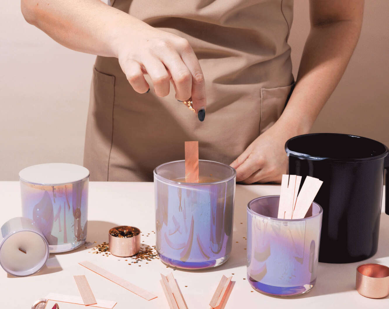 woman making a candle